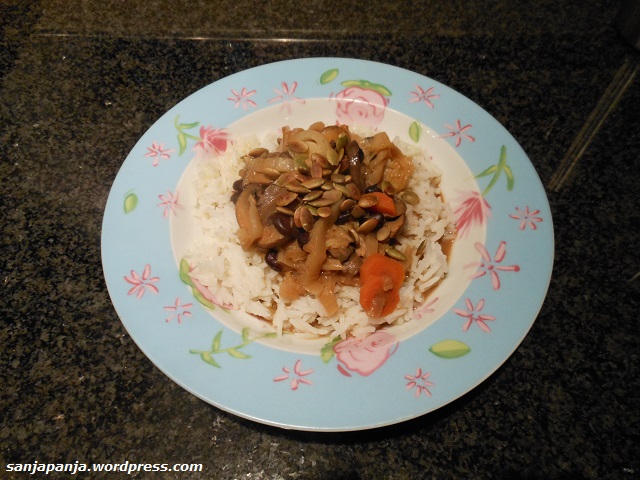Dinner: Chicken Ajam Paniki on rice with some roasted pumpkin seeds.